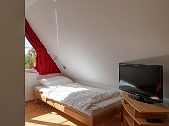 Schlafbereich im ausgebauten Spitzboden