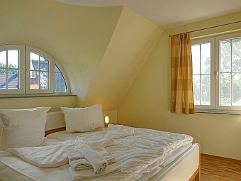Das zweite Eltern-Schlafzimmer im Dachgeschoss